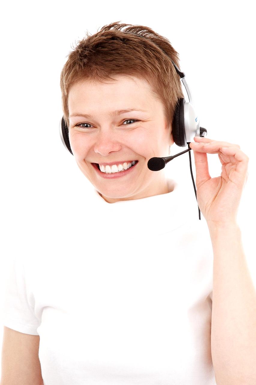 Customer support team assisting clients via phone and email