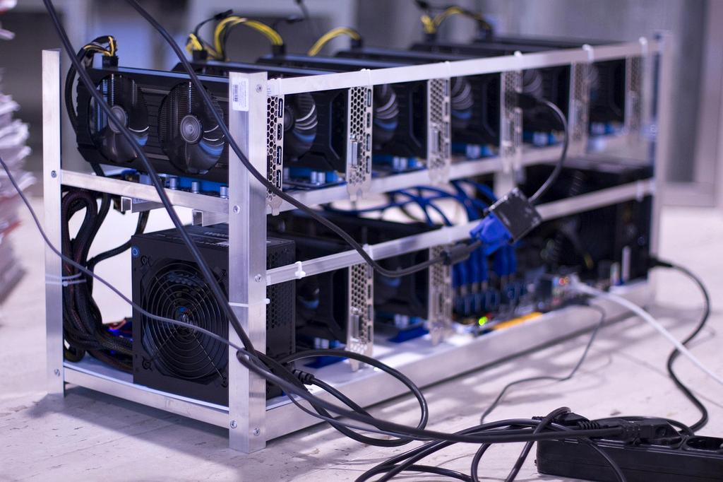 Advanced neural network research laboratory with multiple GPU clusters and holographic displays showing network architectures