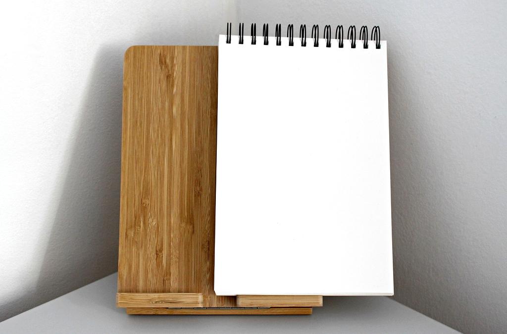 Person analyzing process scheduling charts on computer screen